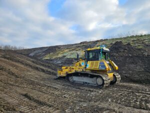 SDX-Compact von Sodex Innovations auf einer fahrenden Planierraupe